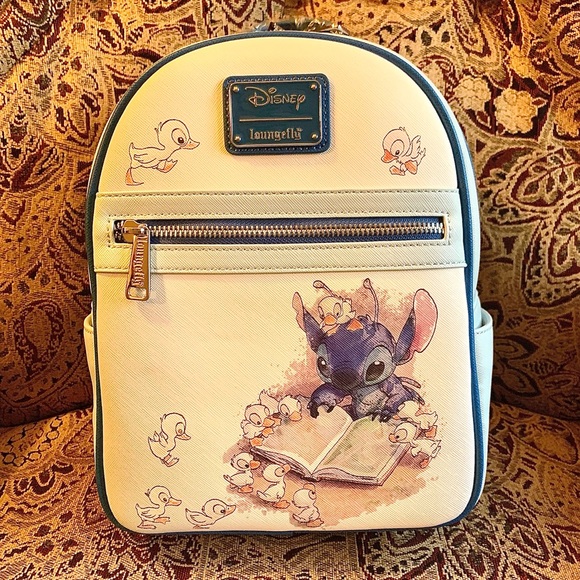 Disney Handbags - NWT Disney Loungefly Lilo and Stitch Backpack